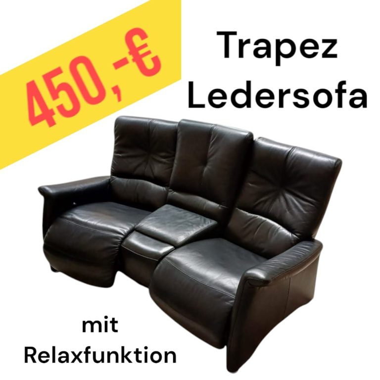 Schwarzes Ledersofa mit Relaxfunktion, Preis 450 €.